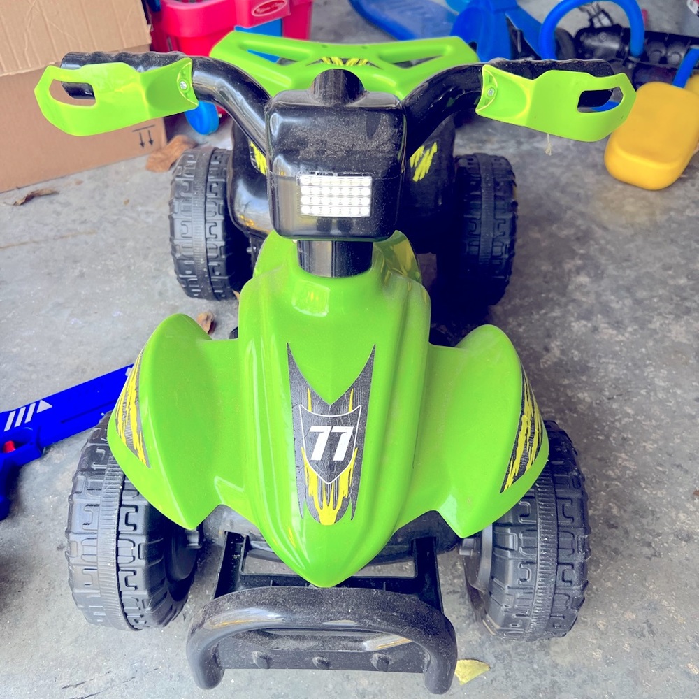 Ride on motorcycle, battery operated. Like new.